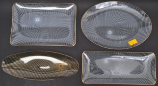 SET OF FOUR MID CENTURY HELIX TWIST GLASS SERVING PLATES