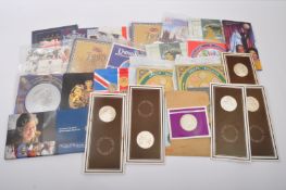 ASSORTMENT OF VINTAGE COMMEMORATIVE UNCIRCULATED COINS SETS