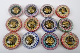 TWELVE MILLEFIORI & SULFUR BOULE GLASS PAPERWEIGHTS