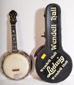 VINTAGE SUPREME BANJOLELE IN VINTAGE HARD CASE