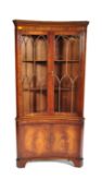 GEORGE III STYLE FLAME MAHOGANY CONCAVE CORNER CABINET