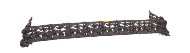 MANNER OF CHRISTOPHER DRESSER - CAST IRON FIRE FENDER