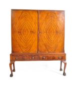 MID 20TH CENTURY WALNUT COCKTAIL CABINET ON STAND