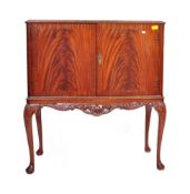 20TH CENTURY WALNUT CHIPPENDALE STYLE DRINKS CABINET