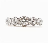 18CT WHITE GOLD & DIAMOND FIVE STONE RING