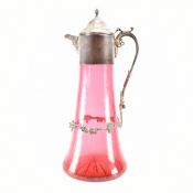 A SILVER AND CUT GLASS CLARET PITCHER