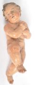 18TH CENTURY POLYCHROME FIGURE OF A CHERUB