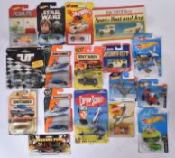 COLLECTION OF ASSORTED VINTAGE CARDED DIECAST MODEL CARS