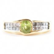 14CT GOLD PERIDOT & DIAMOND CROSSOVER RING