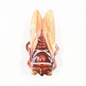 1920S ART NOUVEAU CARVED HORN CICADA BROOCH