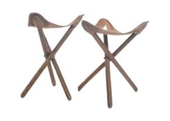 PAIR OF VINTAGE CIRCA 1970S LEATHER CAMPAIGN TRIPOD STOOLS