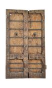 PAIR OF 20TH CENTURY DECORATIVE OAK AND IRON DOORS