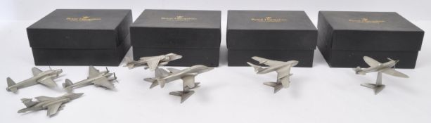 TWELVE ROYAL HAMPSHIRE ART FOUNDRY METAL PLANES MODELS