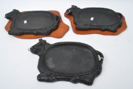 THREE VINTAGE CAST METAL & TEAK COW DISHES