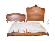 20TH CENTUIRY FRENCH CARVED WALNUT KING SIZE BED