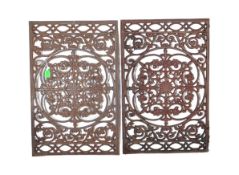 PAIR OF EARLY 20TH CENTURY CAST IRON TABLE TOP TRIVETS