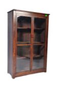 20TH CENTURY OAK TWIN DOOR GLAZED BOOKCASE CABINET