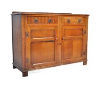 20TH CENTURY JACOBEAN REVIVAL CARVED OAK SIDEBOARD