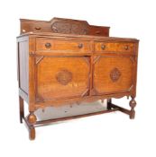 1920S OAK JACOBEAN REVIVAL SIDEBOARD