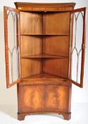 GEORGE III STYLE FLAME MAHOGANY CONCAVE CORNER CABINET