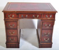 GEORGE III REVIVAL MAHOGANY KNEEHOLE TWIN PEDESTAL DESK