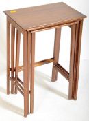 EDWARDIAN MAHOGANY INLAID NEST OF GRADUATING TABLES