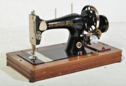 VINTAGE 'THE HARRIS N.9H' TRAVELLING SEWING MACHINE IN CASE