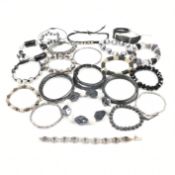 COLLECTION OF ASSORTED BLACK TONE BANGLES & BRACELETS