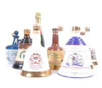 EIGHT BOTTLES OF BELLS WHISKY & CHAMPAGNE