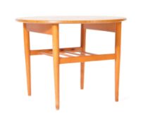 MID 20TH CENTURY TEAK FORMWOOD CIRCULAR COFFEE TABLE