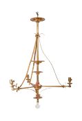 AN EARLY 20TH CENTURY TALL BRASS TIERED CEILING LIGHT