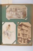 COLLECTION OF EARLY 20TH CENTURY POSTCARDS IN AN ANTIQUE ALBUM