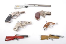 ASSORTMENT OF VINTAGE NOVELTY GUN SHAPED LIGHTERS