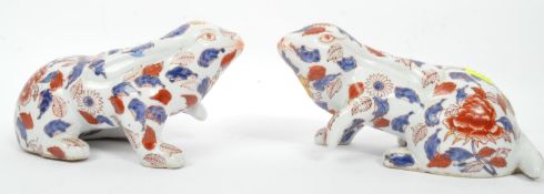 IMARI RABBITS - PAIR OF EARLY 20TH CENTURY CERAMIC FIGURES