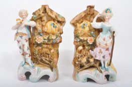 PAIR OF EARLY 20TH CENTURY HAND PAINTED BISQUE VASES