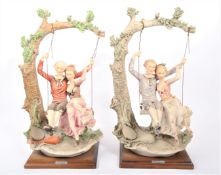 TWO VINTAGE CAPODIMONTE PORCELAIN FIGURES - LOVERS ON SWING