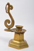 EARLY 20TH CENTURY BRASS CANDLESTICK HOLDER.
