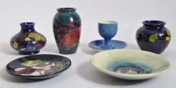 ASSORTMENT OF VINTAGE MOORCROFT POTTERY VASES & PLATES