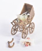 LATE 19TH CENTURY MINIATURE DUTCH PEG DOLLS & PRAM