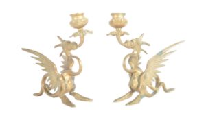 PAIR OF 19TH CENTURY BRASS GRIFFIN CANDLESTICKS