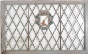 18TH CENTURY STAINED GLASS WINDOW WITH CENTRAL CREST