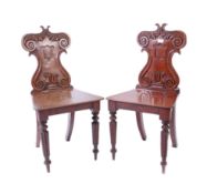 PAIR VICTORIAN 19TH CENTURY MAHOGANY ARMORIAL HALL CHAIRS