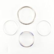 COLLECTION OF FOUR SILVER BANGLES