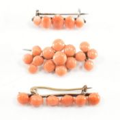 THREE CORAL CABOCHON BROOCH PINS
