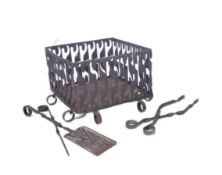 20TH CENTURY CAST IRON PIERCED FIRE BASKET