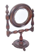 A VICTORIAN 19TH CENTURY WALNUT LADIES SWING MIRROR