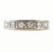 18CT WHITE GOLD & DIAMOND SEVEN STONE RING
