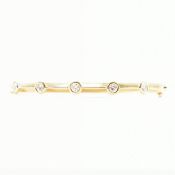 18CT GOLD & DIAMOND BANGLE BRACELET