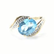 HALLMARKED 9CT GOLD TOPAZ & DIAMOND CROSSOVER RING