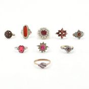 COLLECTION OF ASSORTED SILVER & RED STONE SET RINGS